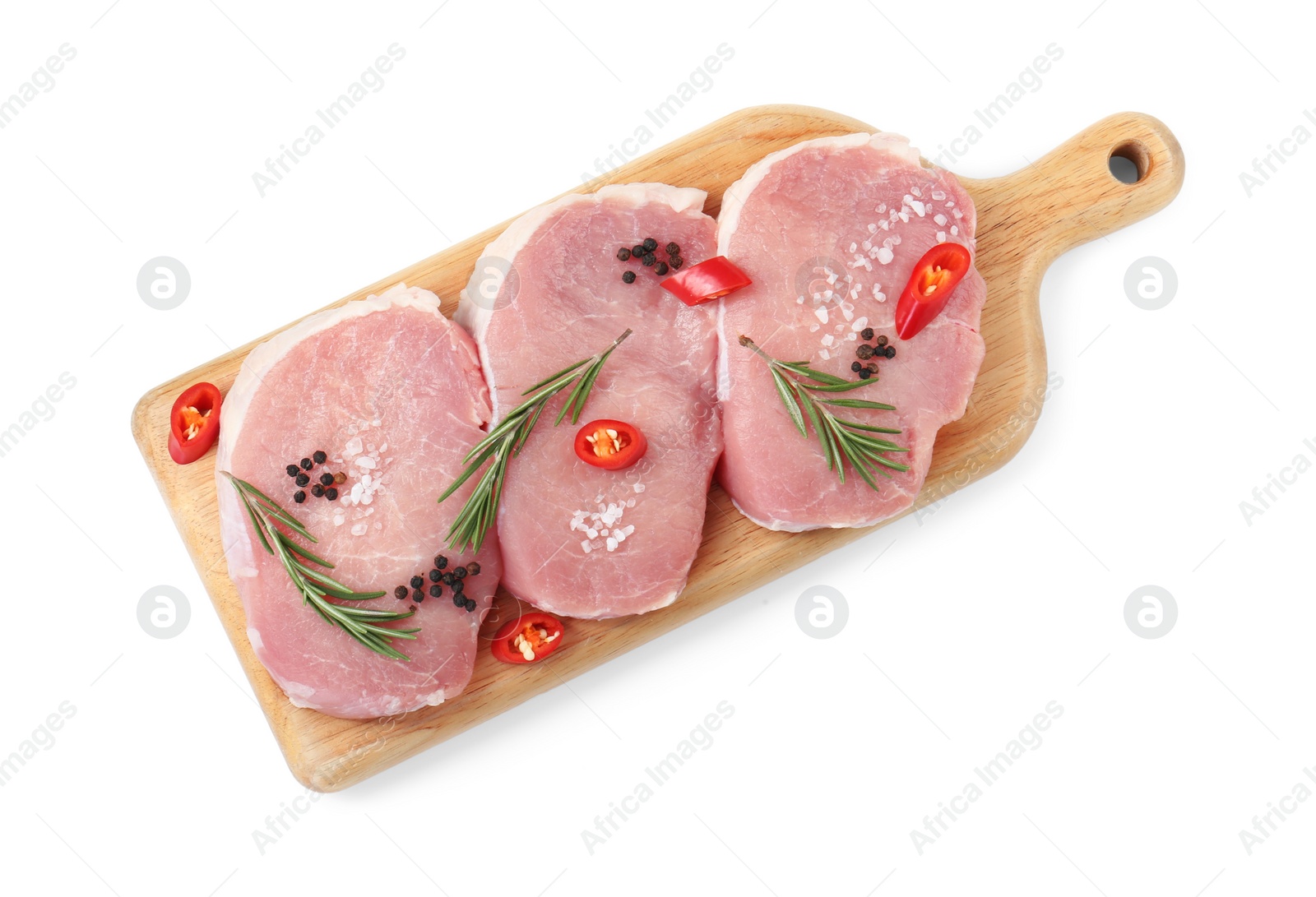 Photo of Wooden board with pieces of raw pork meat and spices isolated on white, top view