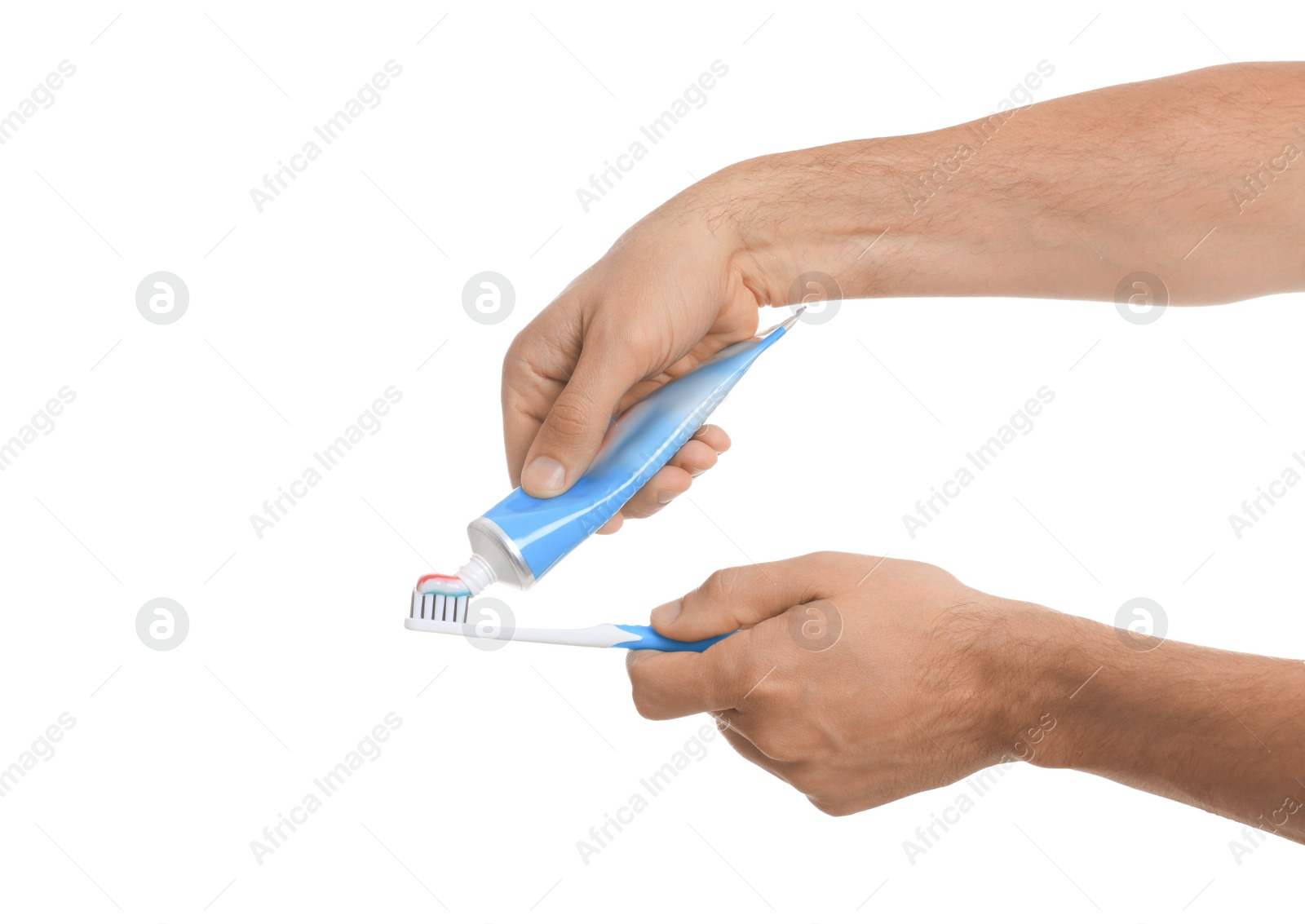 Photo of Man applying toothpaste on brush against white background, closeup