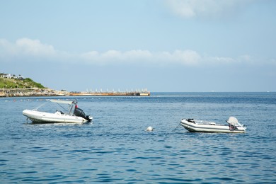 Photo of Inflatable boat on sea under blue sky