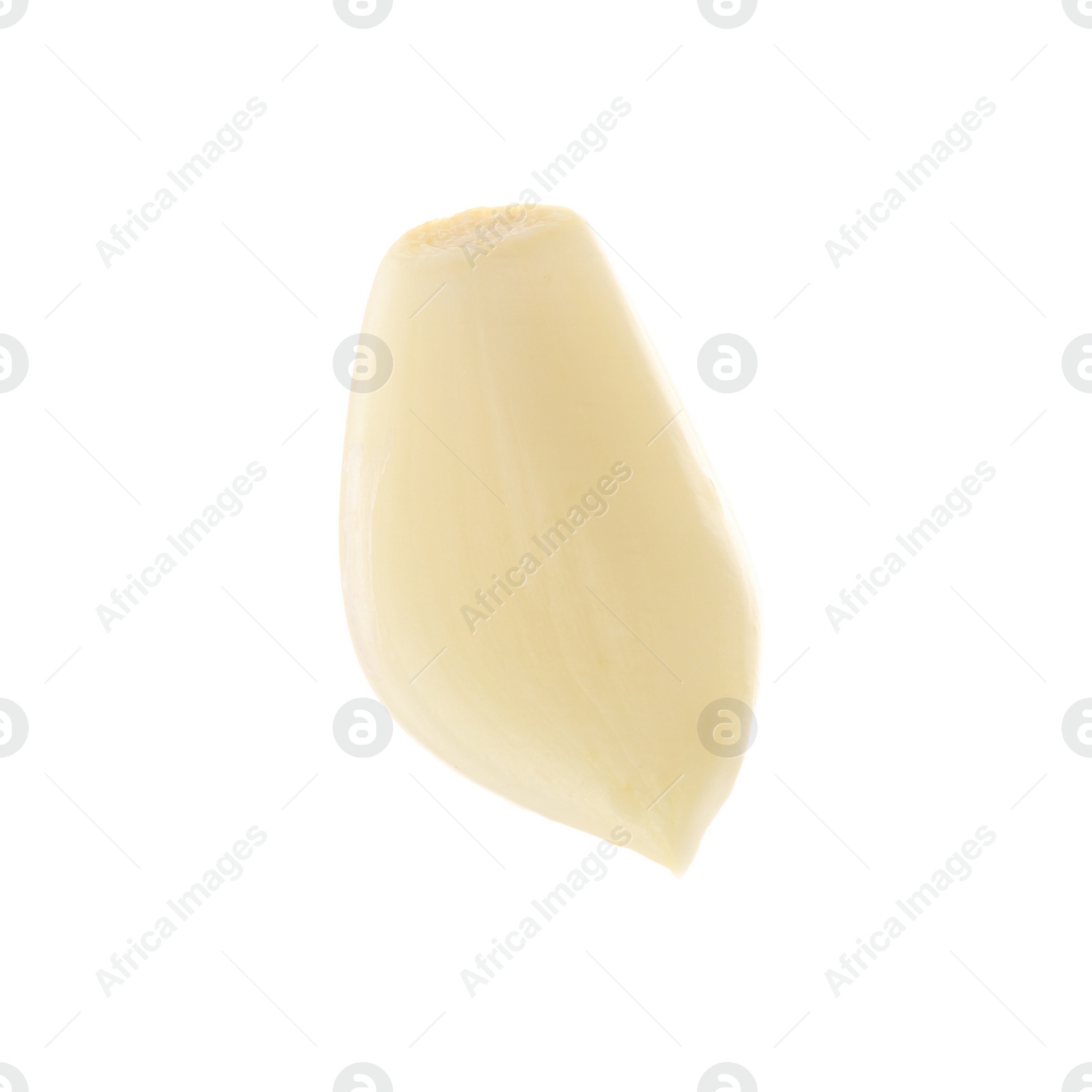 Photo of One peeled clove of garlic isolated on white