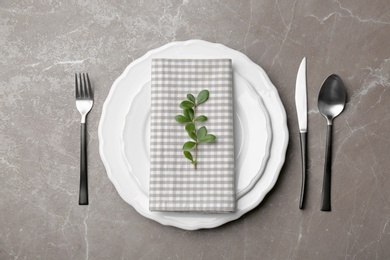 Photo of Elegant table setting on marble background, top view