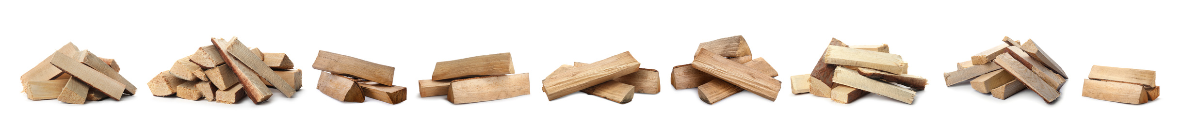 Image of Set of cut firewood on white background. Banner design