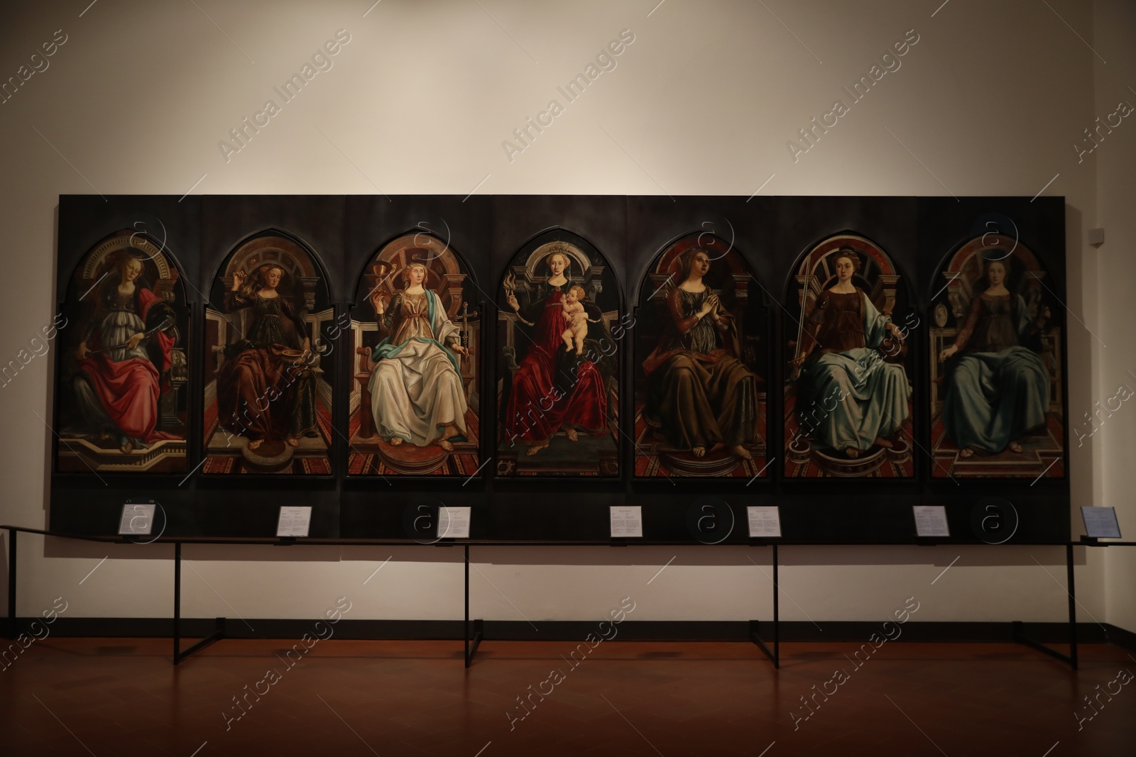 Photo of Florence, Italy - February 8, 2024: Famous «Seven Virtues» by Sandro Botticelli at Uffizi gallery