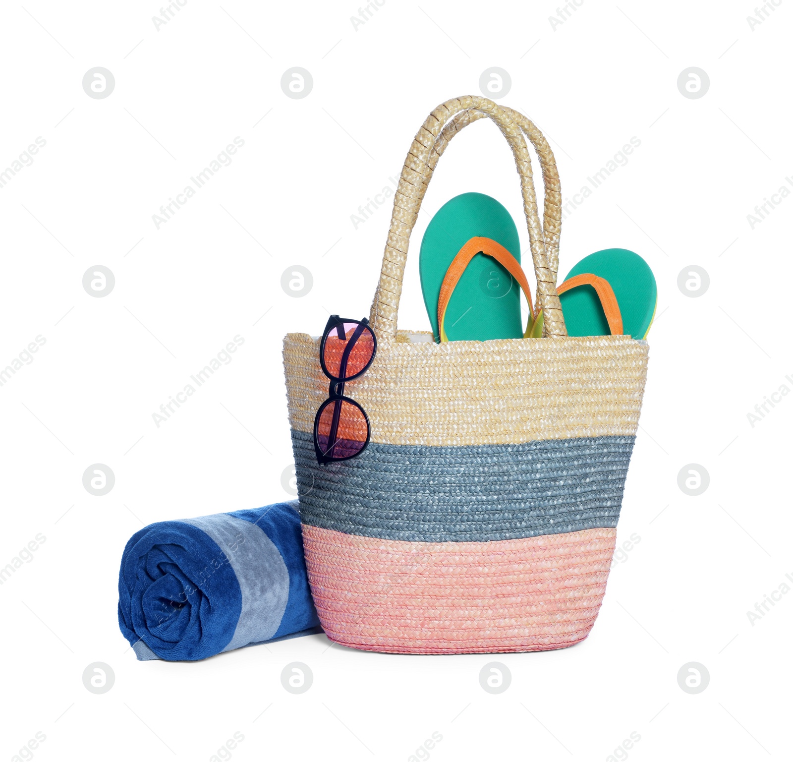 Photo of Beach bag, towel, sunglasses and flip flops isolated on white