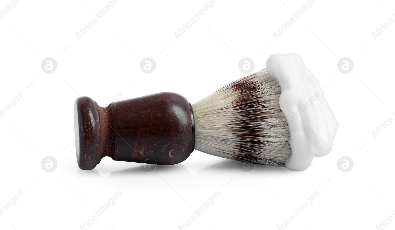 Photo of Shaving brush with foam isolated on white