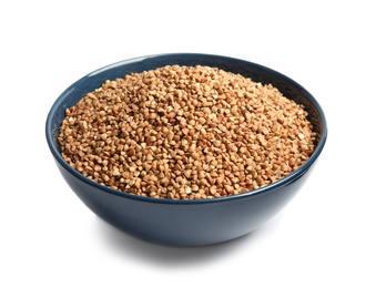 Photo of Bowl with uncooked buckwheat on white background