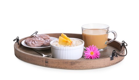 Wooden tray with delicious breakfast and beautiful flower on white background