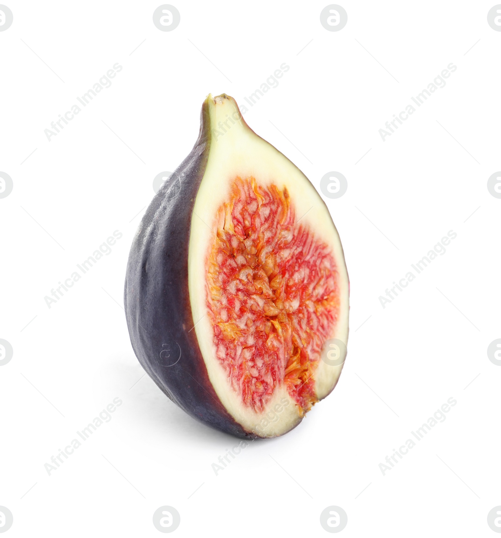 Photo of Half of ripe purple fig on white background