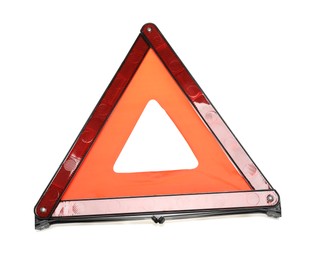 Photo of Emergency warning triangle isolated on white, top view. Car safety