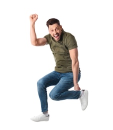 Photo of Full length portrait of happy handsome man jumping on white background