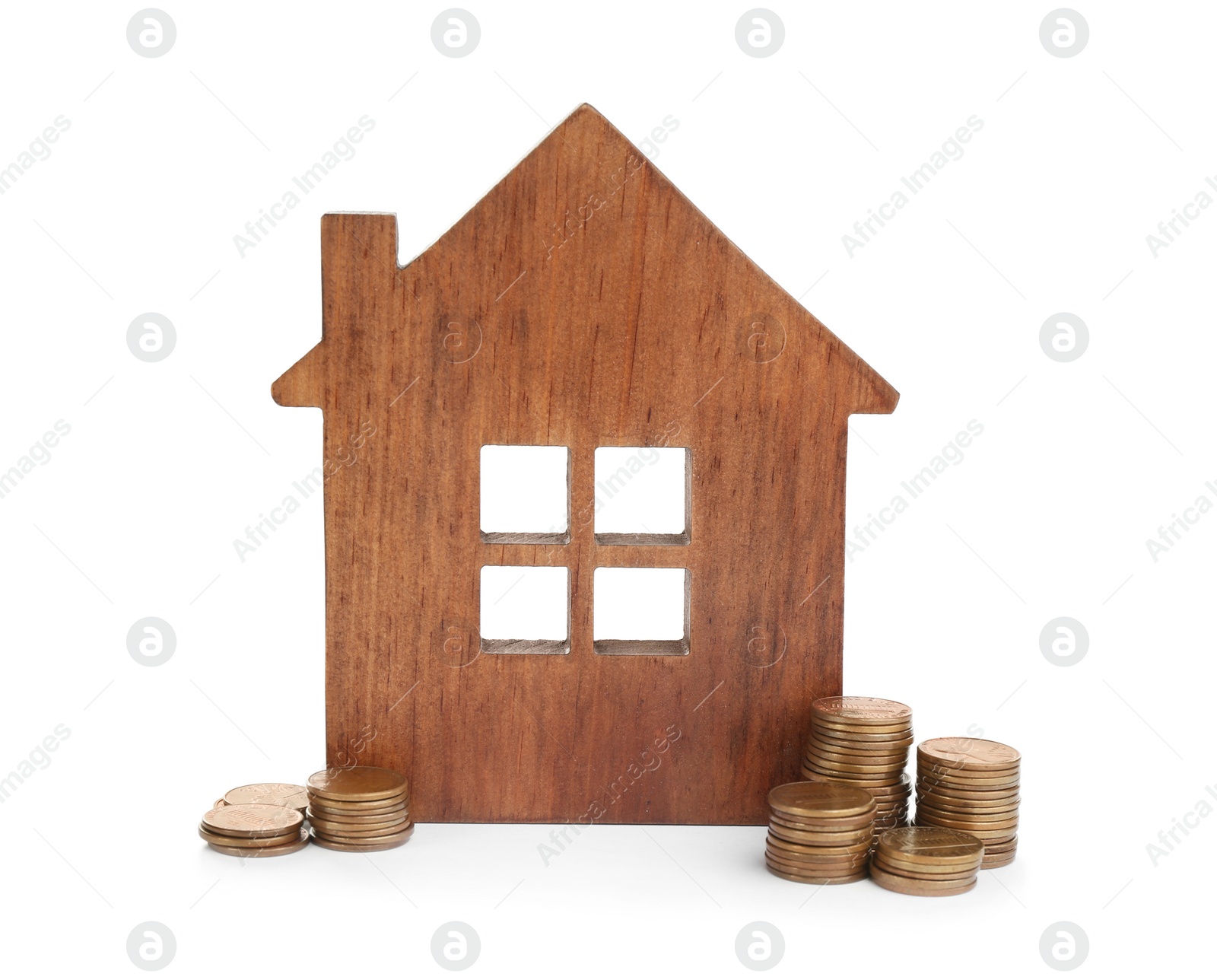 Photo of House model and coins isolated on white