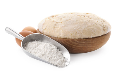 Photo of Dough, eggs and flour on white background. Cooking pastries