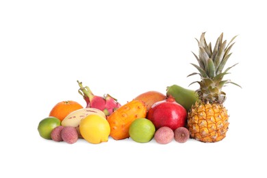 Photo of Pile of different exotic fruits on white background