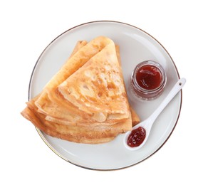 Photo of Delicious crepes with jam on white background, top view