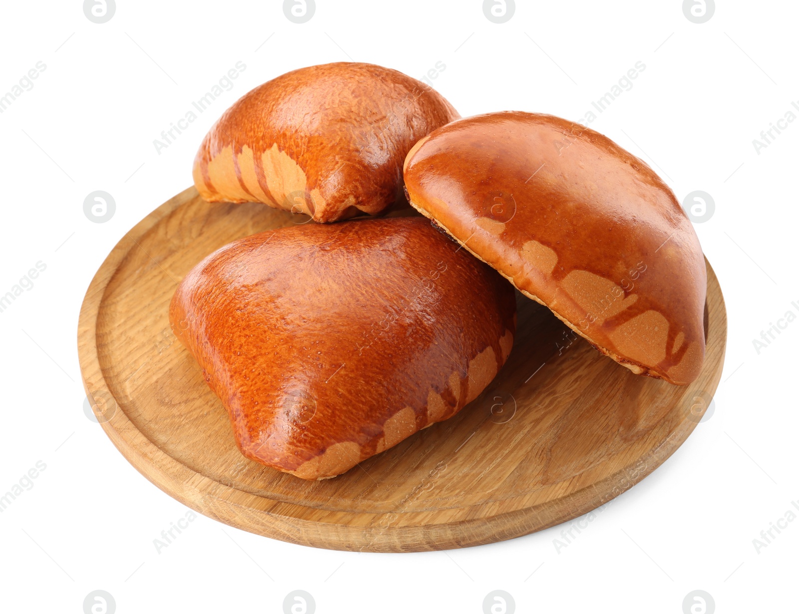 Photo of Wooden board with delicious baked patties on white background