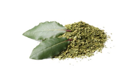 Heap of ground and fresh bay leaves on white background
