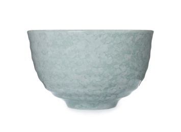 Photo of New beautiful ceramic bowl isolated on white