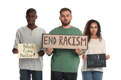 Group of people holding signs on white background. Racism concept