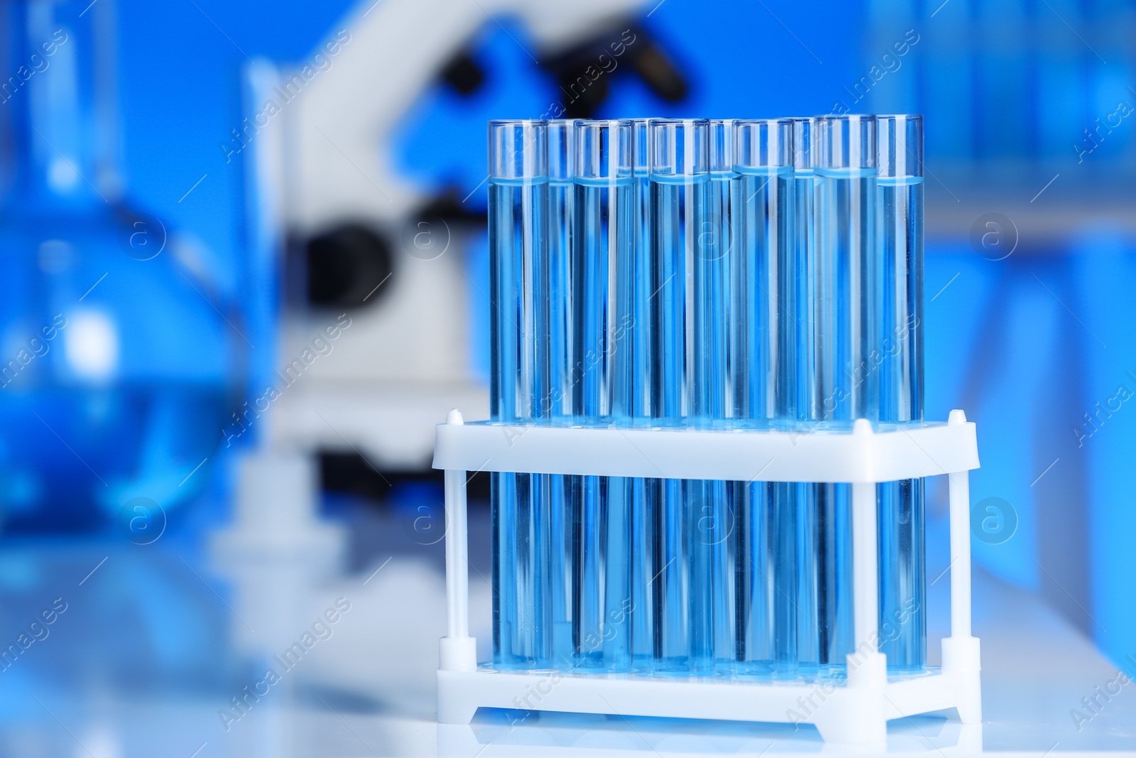 Photo of Holder with test tubes in laboratory. Chemical analysis