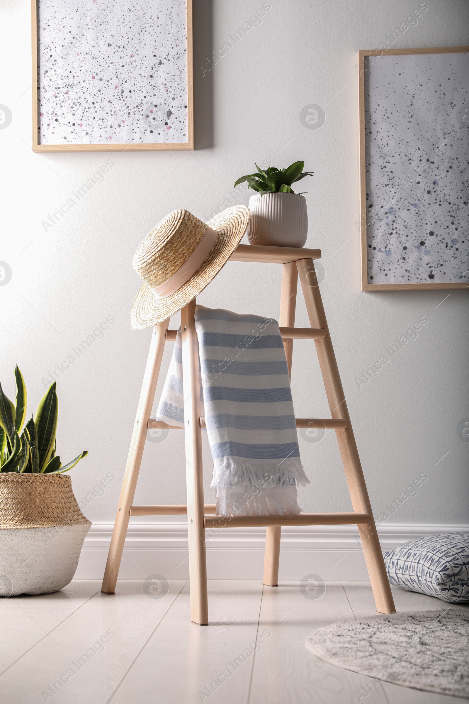 Photo of Beautiful room interior with stylish wooden ladder
