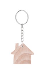 Photo of One wooden keychain in shape of house isolated on white