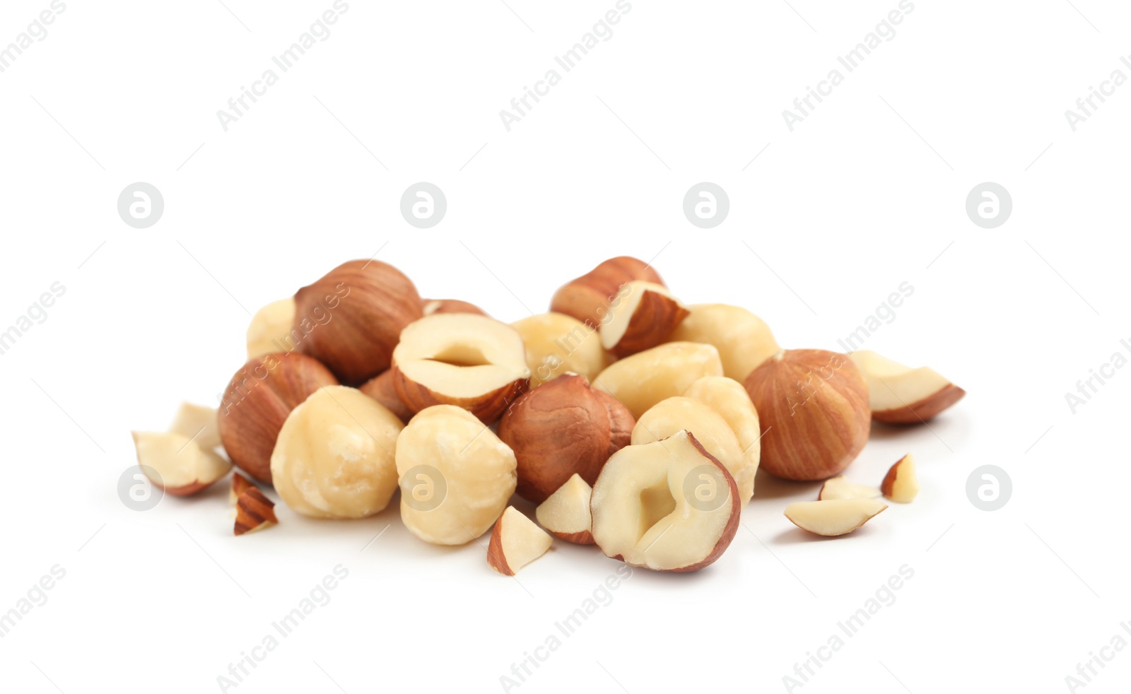 Photo of Heap of tasty hazelnuts on white background