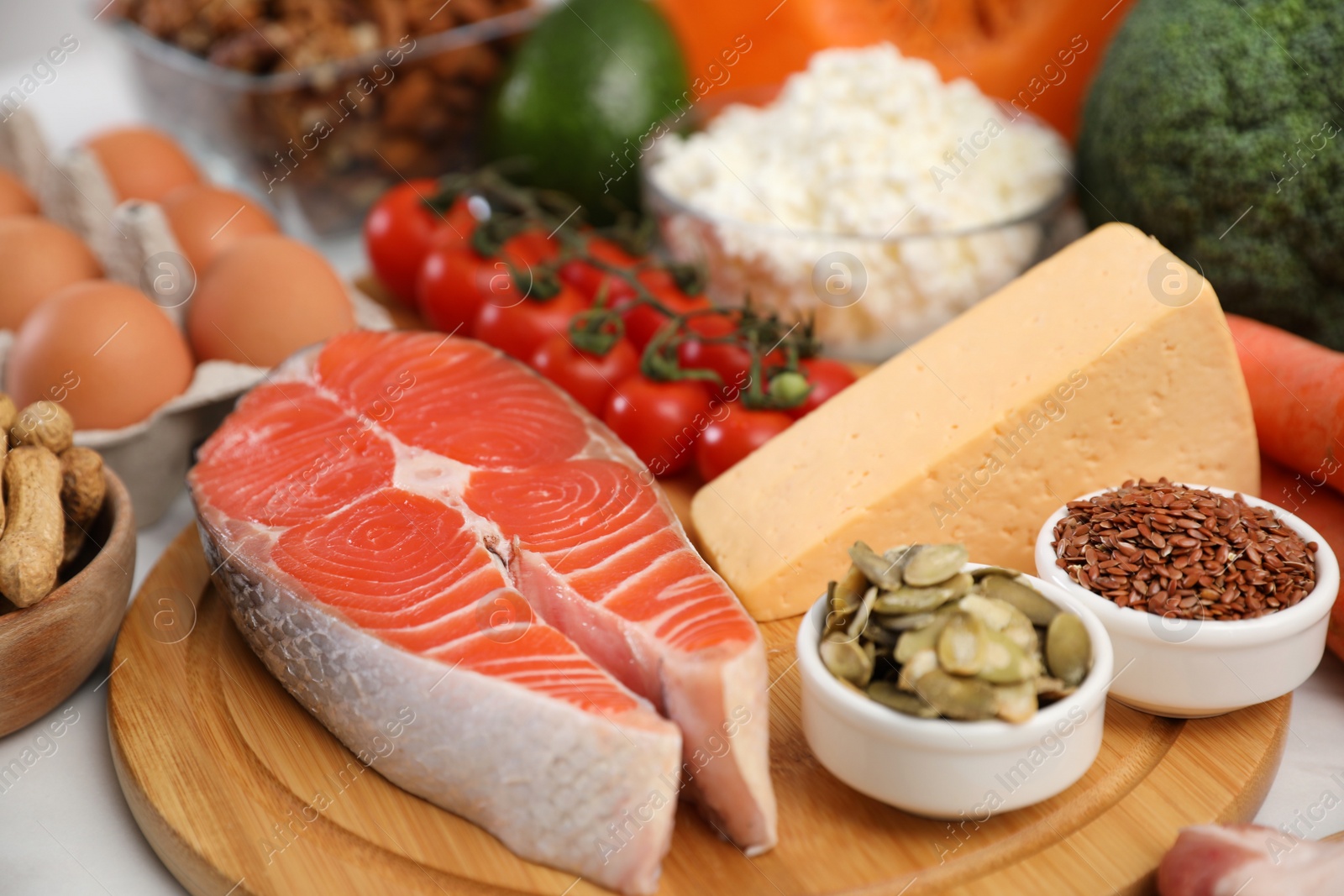 Photo of Composition with healthy food on white table. Keto diet