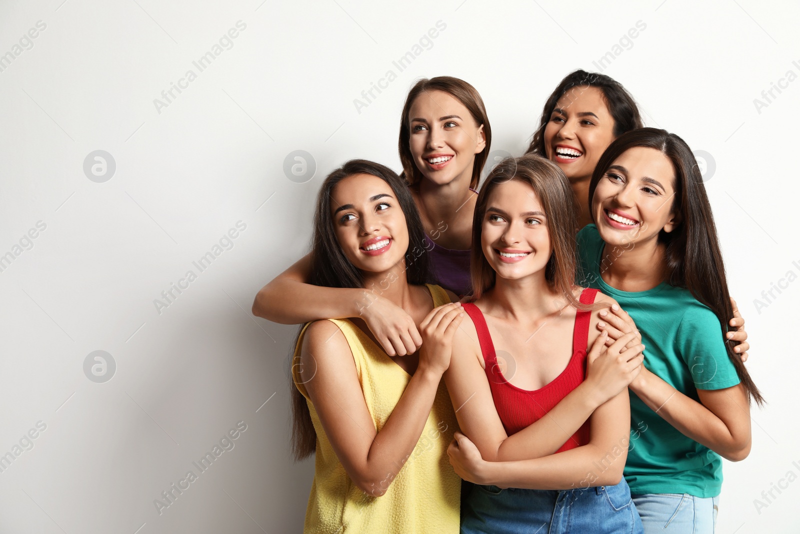 Photo of Happy women on white background, space for text. Girl power concept