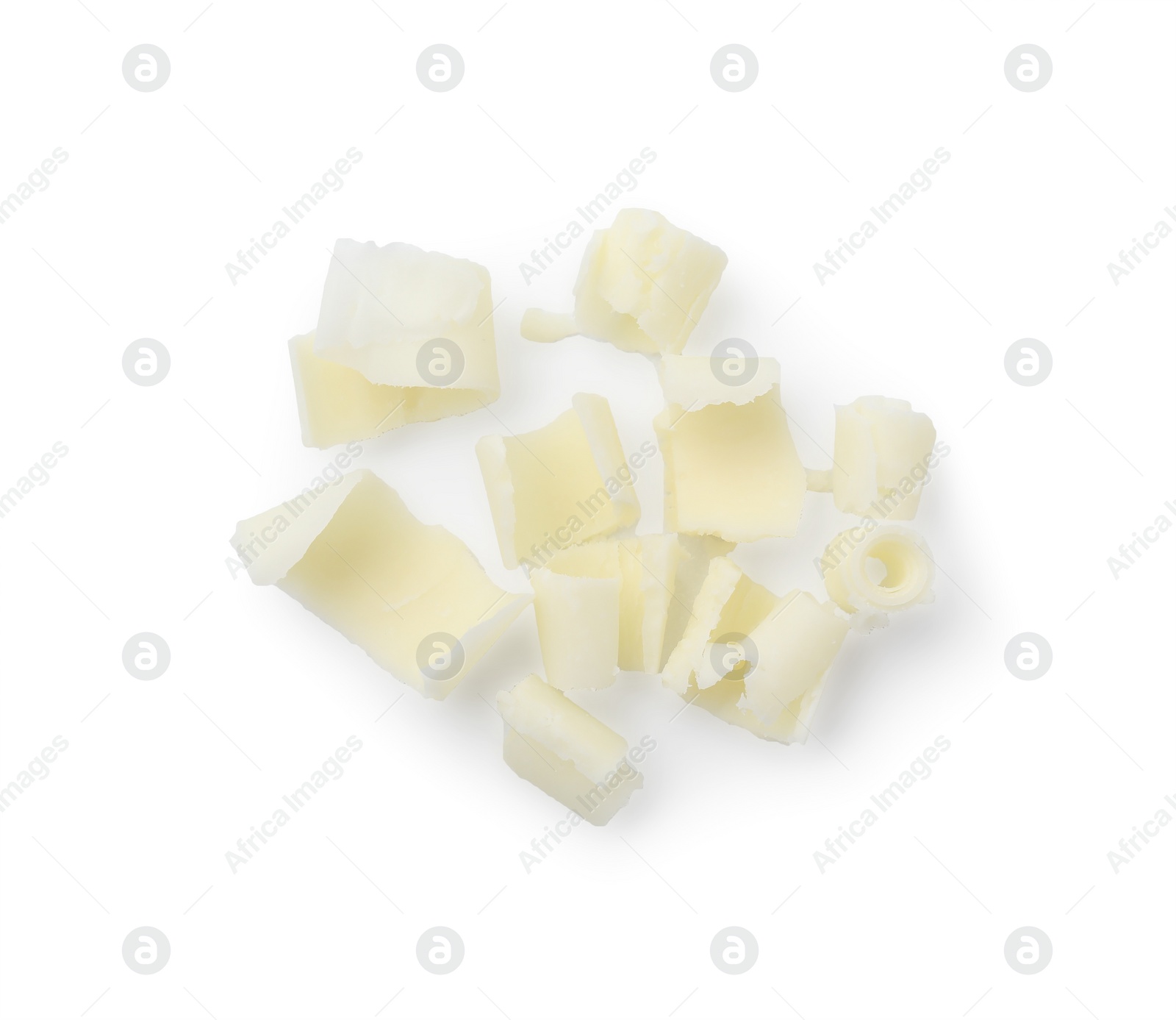 Photo of Many tasty chocolate shavings isolated on white, top view