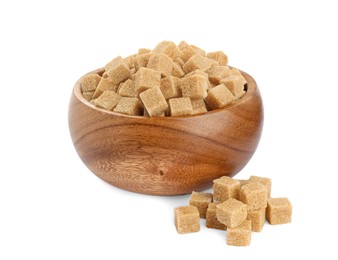 Photo of Wooden bowl and brown sugar cubes on white background