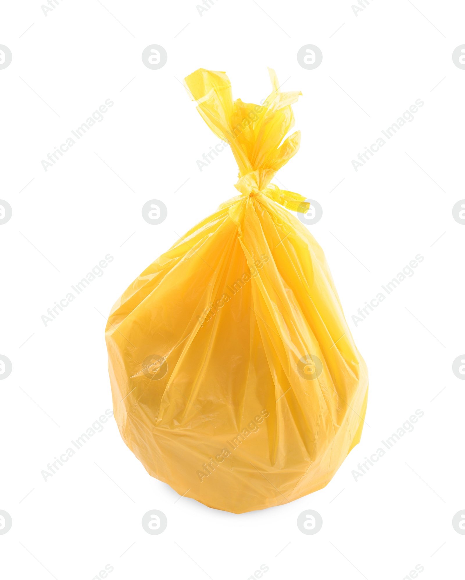 Photo of Yellow plastic garbage bag isolated on white