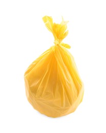 Photo of Yellow plastic garbage bag isolated on white