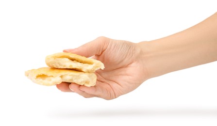 Photo of Woman holding delicious samosa on white background, closeup