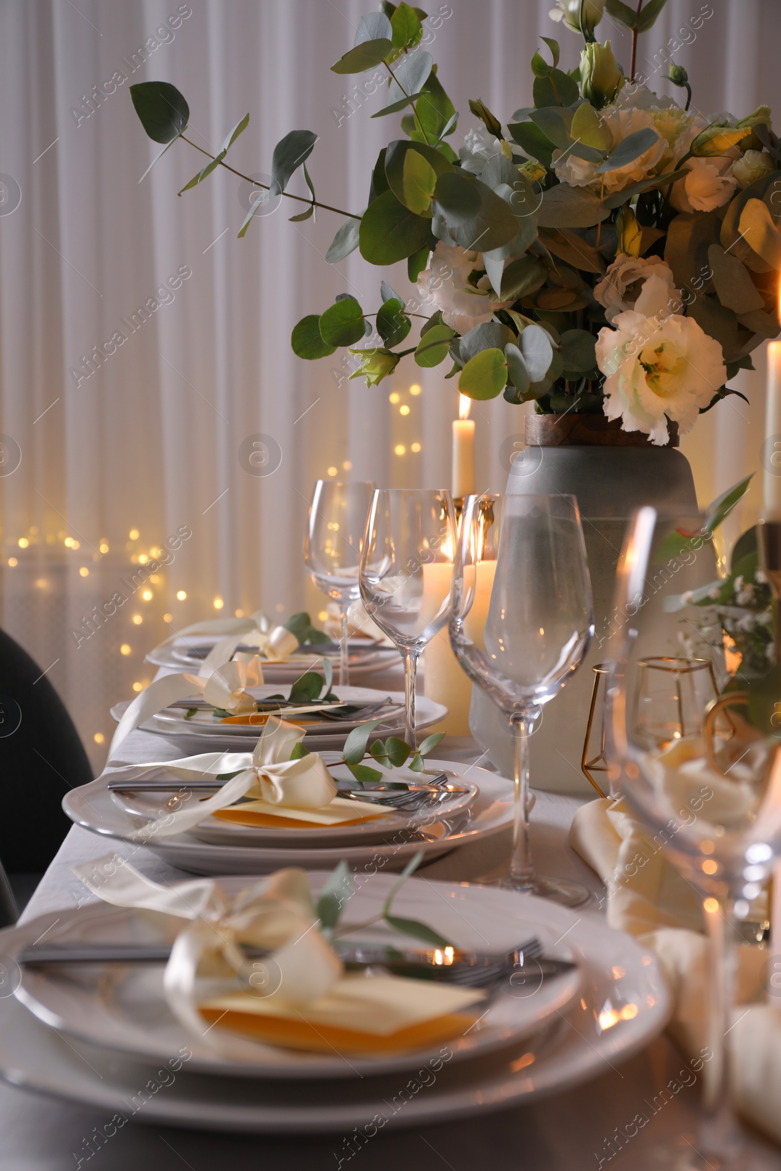 Photo of Festive table setting with beautiful decor indoors