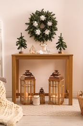 Photo of Beautiful Christmas decor in contemporary room. Interior design