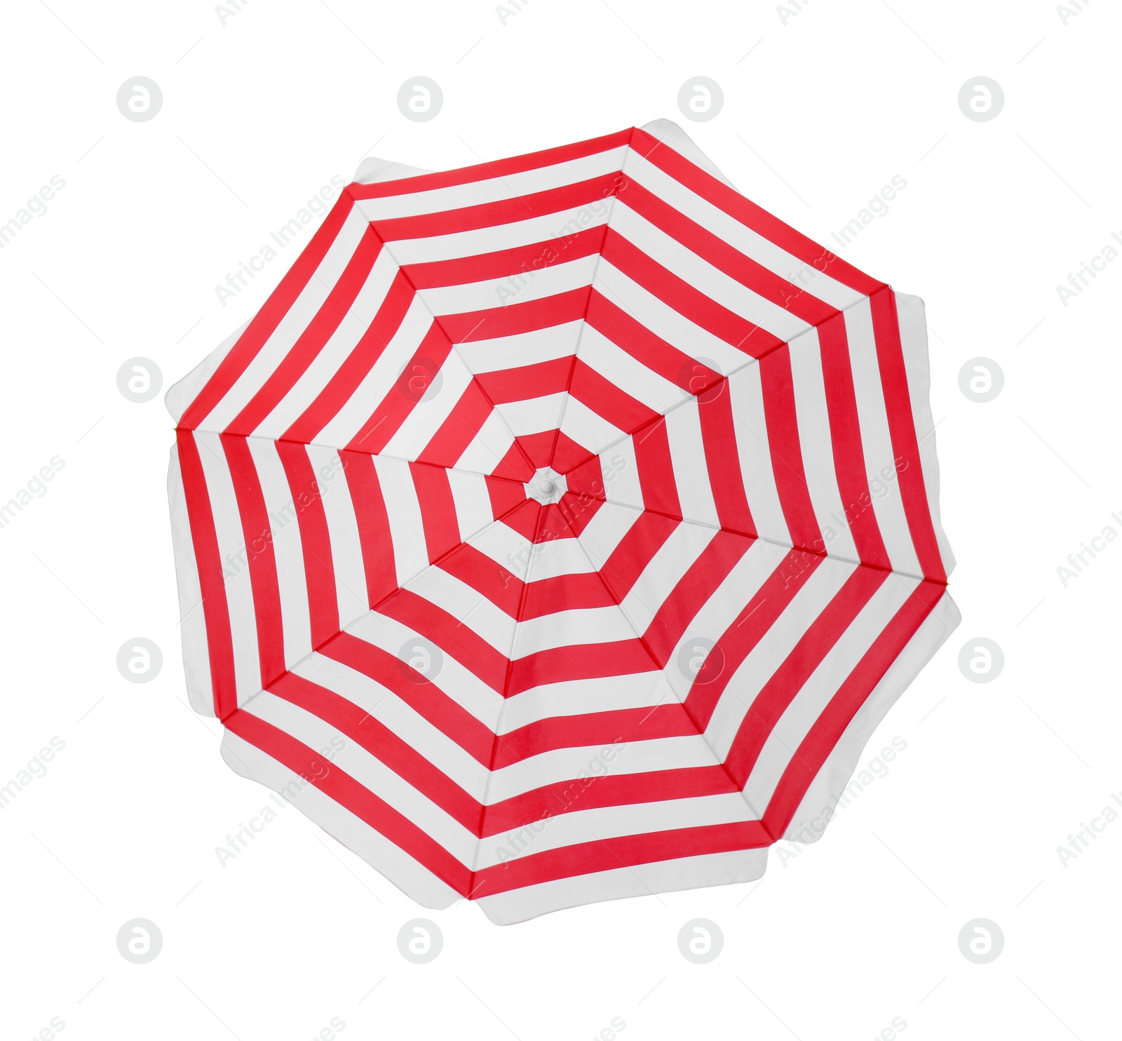 Photo of Open red striped beach umbrella isolated on white