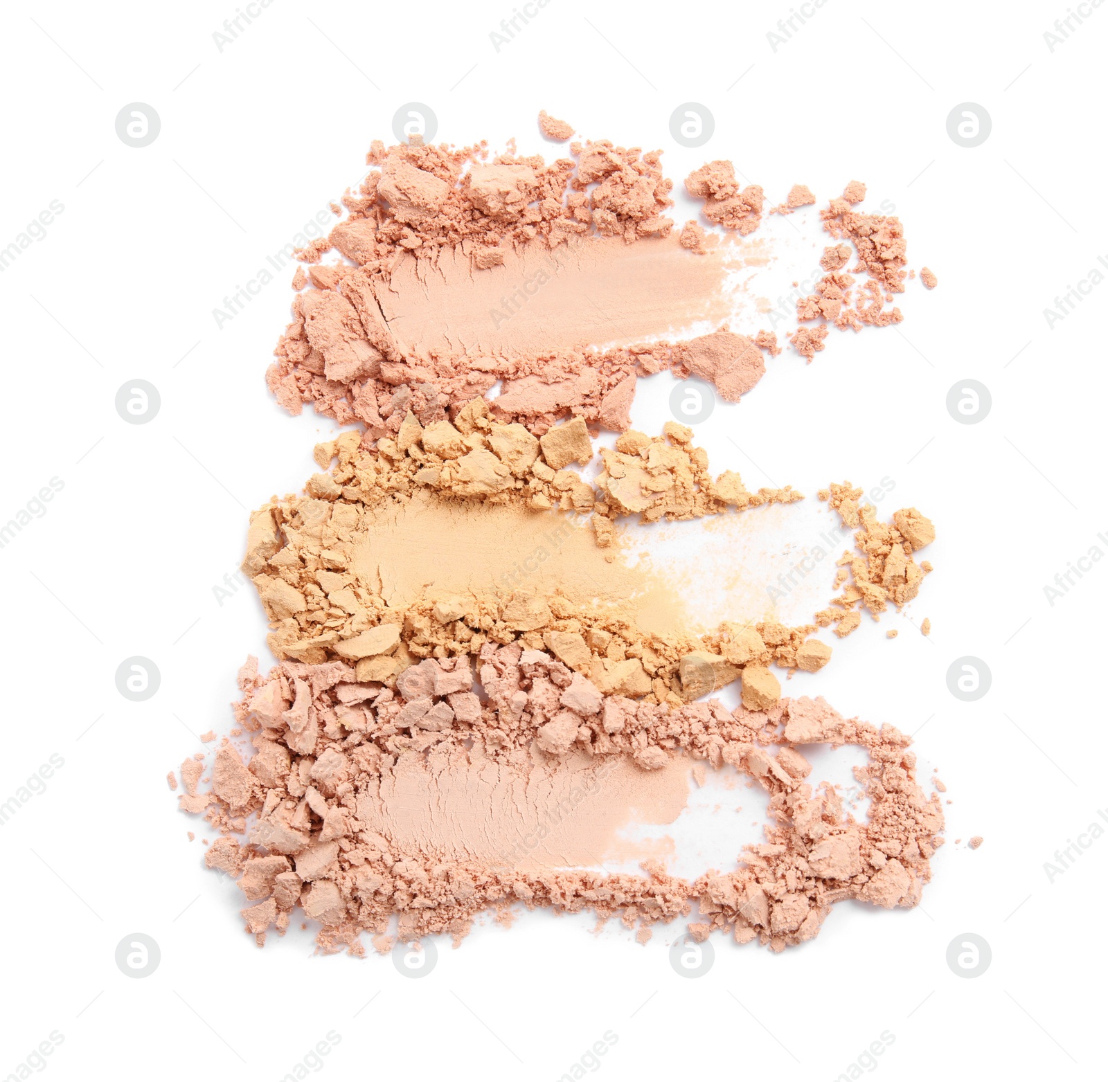 Photo of Swatches of different crushed face powders on white background, top view