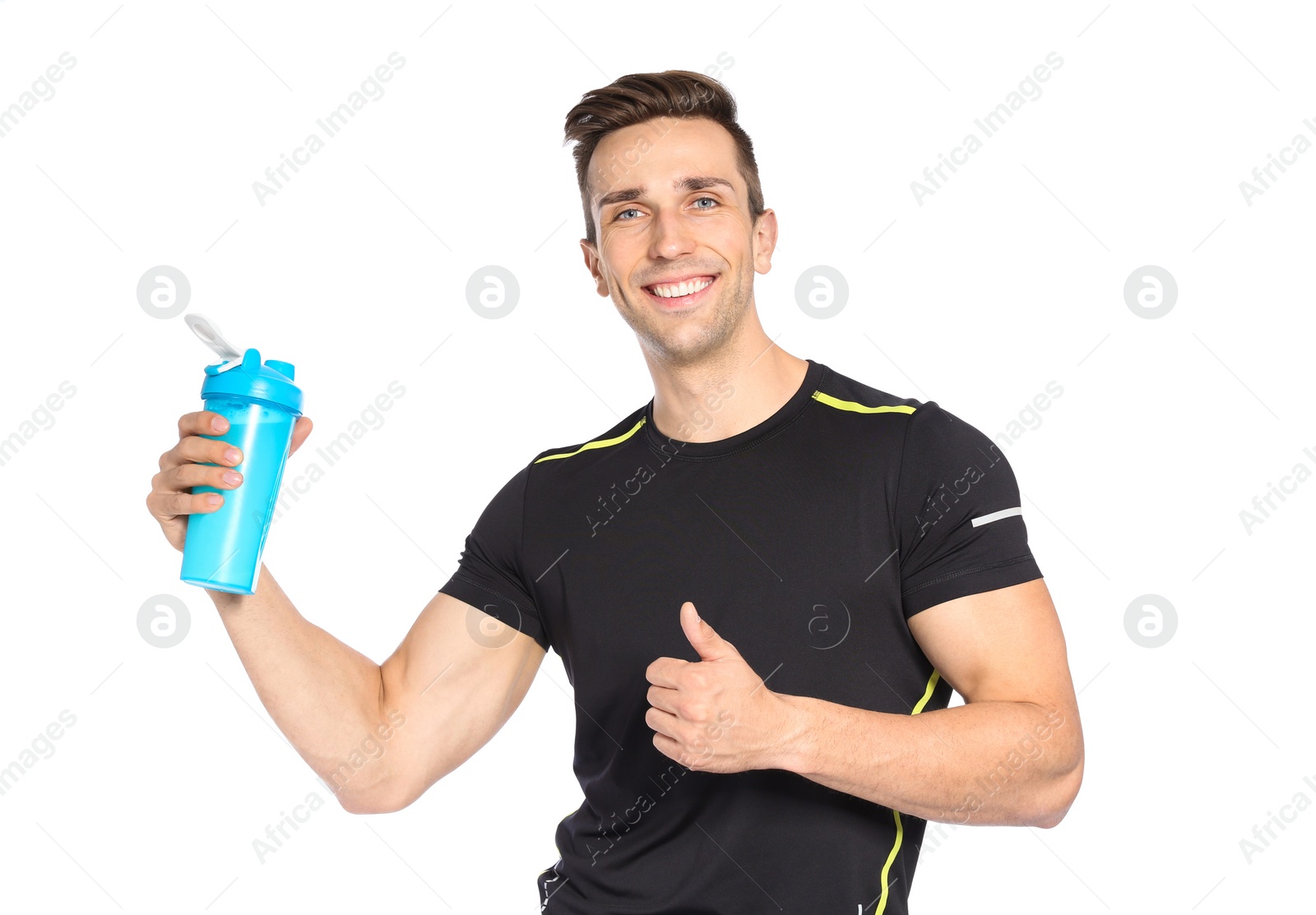 Photo of Portrait of man with bottle of protein shake on white background