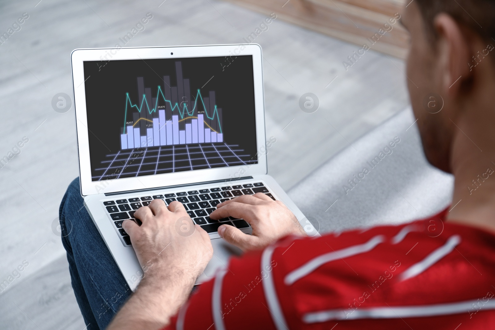 Image of  Broker working with laptop indoors, closeup. Forex trading