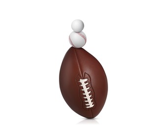 Stack of different sport balls on white background