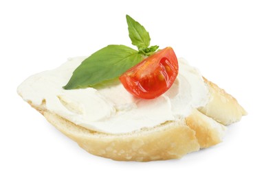 Photo of Bruschetta with cream cheese, tomato and basil leaves isolated on white