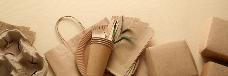 Image of Flat lay composition with eco friendly products on beige background. Banner design