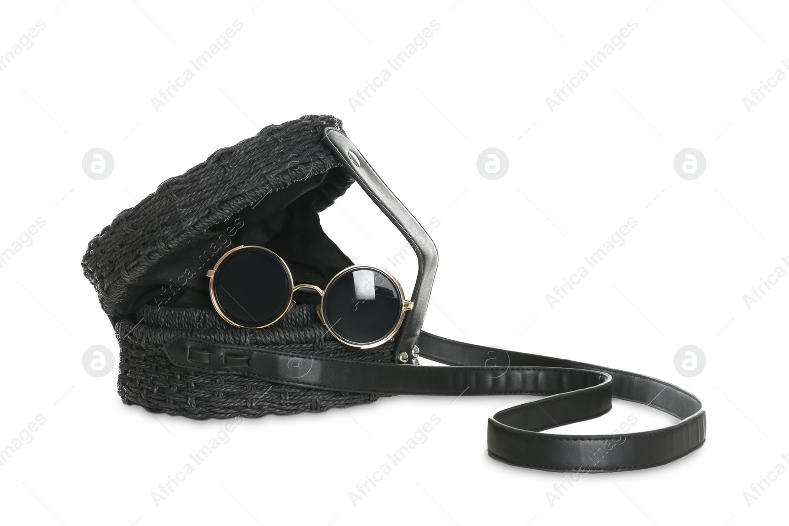 Photo of Stylish woman's bag and sunglasses isolated on white