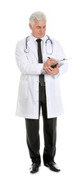 Full length portrait of male doctor with clipboard isolated on white. Medical staff