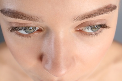 Young woman with beautiful natural eyelashes, closeup