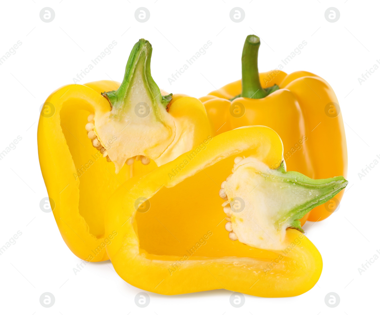 Photo of Cut yellow bell peppers isolated on white