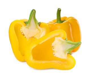 Cut yellow bell peppers isolated on white