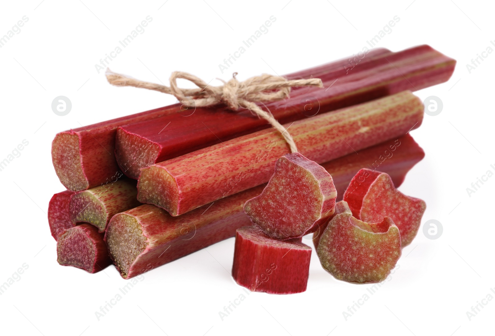 Photo of Cut fresh ripe rhubarb isolated on white