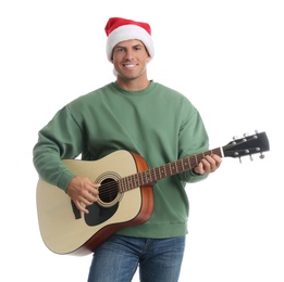 Photo of Man in Santa hat playing acoustic guitar on white background. Christmas music