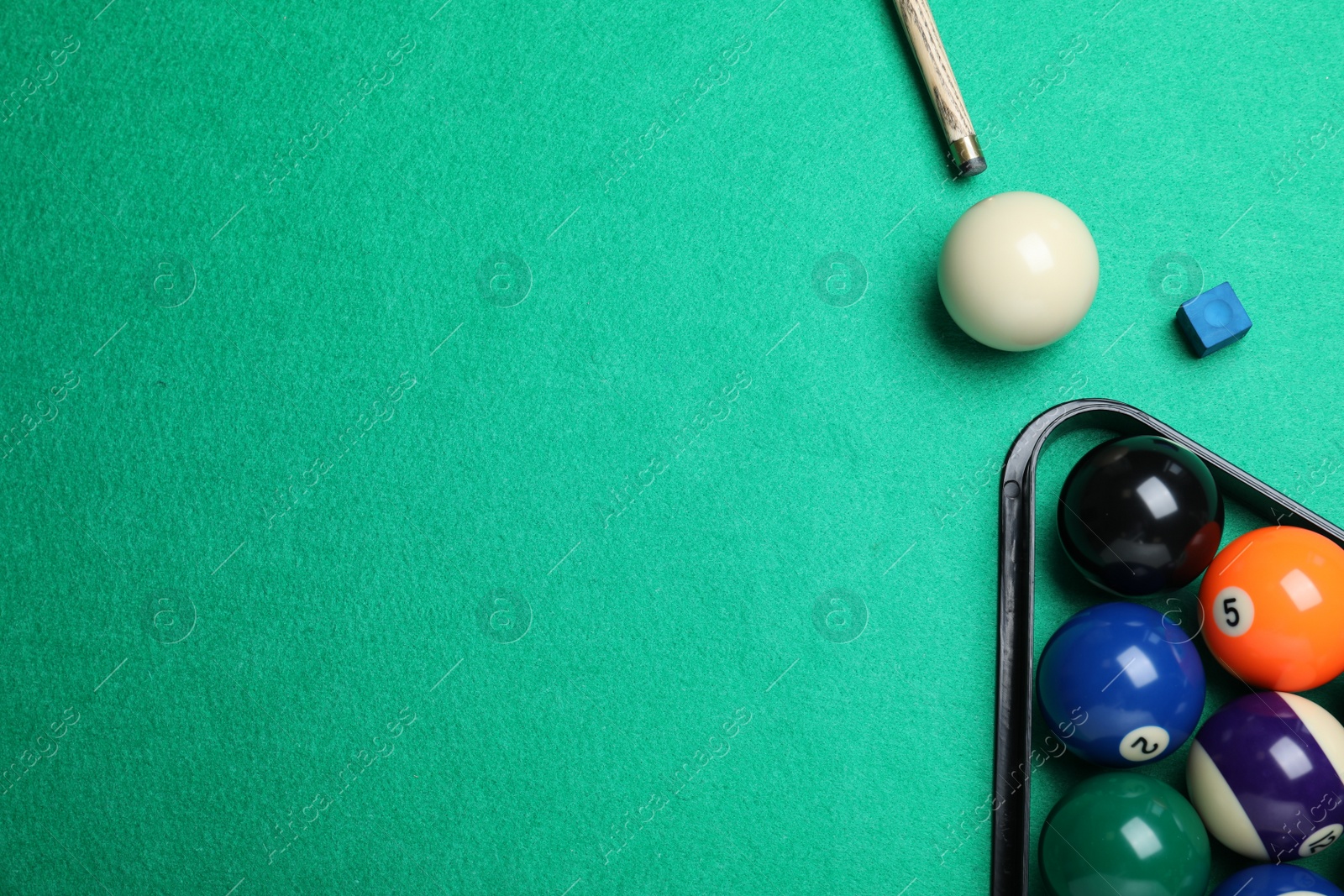 Photo of Flat lay composition with balls on billiard table, space for text